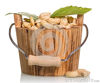 Nuts in wooden bucket Stock Photo