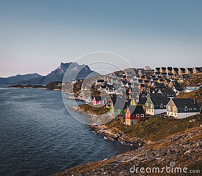 Nuuk capital of Greenland with Beautiful small colorful houses in myggedalen during Sunset Sunrise Midnight Sun Stock Photo