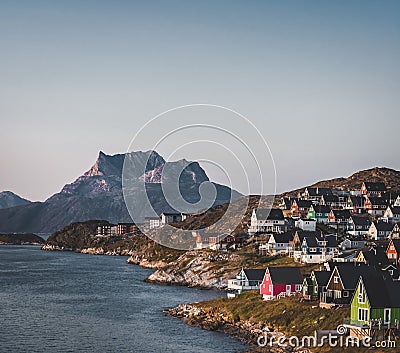 Nuuk capital of Greenland with Beautiful small colorful houses in myggedalen during Sunset Sunrise Midnight Sun Stock Photo