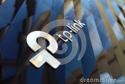 New tp-link logo on wireless router modem tp link Archer C20 AC750 reflective surface Editorial Stock Photo