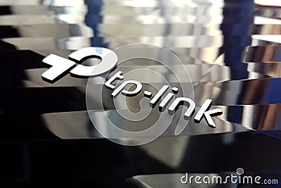 New tp-link logo on wireless router modem tp link Archer C20 AC750 reflective surface Editorial Stock Photo