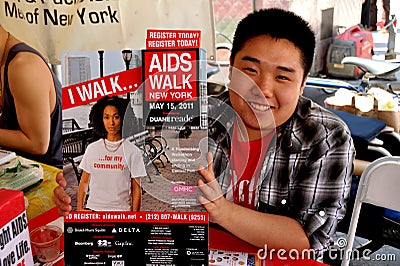 NYC: Asian Man with AIDS Walk Sign Editorial Stock Photo