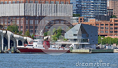 NYC Fire Dept Marine 1 Fire Boat House and fireboat named Three Forty Three in the West Village, Manhattan NYC Editorial Stock Photo