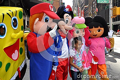 NYC: Little Girl with Cartoon Characters Editorial Stock Photo