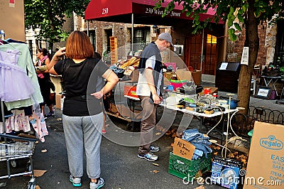 NYC: People Browsing at a Street Fair Editorial Stock Photo