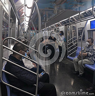 NYC People Wearing Face Mask and Social Distancing Public Transit MTA Subway Train New York Editorial Stock Photo