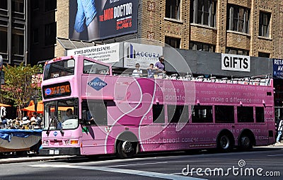 NYC: Pink Tourist Bus Editorial Stock Photo