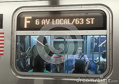 NYC Subway Mass Transit People Commuting to Work Reopening Economy after Covid Quarantine New York Editorial Stock Photo