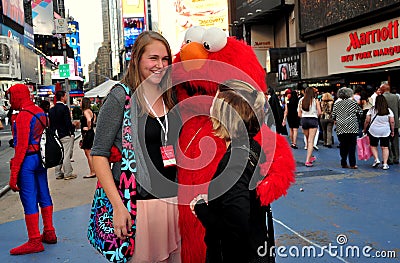 NYC: Tourists with Elmo in Times Square Editorial Stock Photo