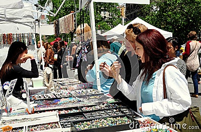 NYC: Women Looking at Jewelry at Street Fair Editorial Stock Photo