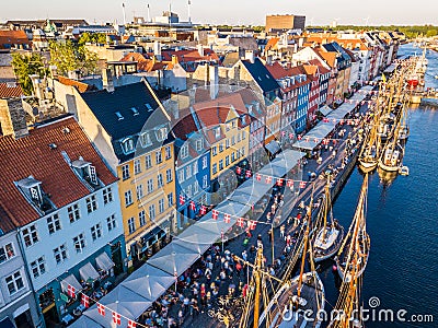 Nyhavn New Harbour canal and entertainment district in Copenhagen, Denmark. The canal harbours many historical wooden Stock Photo