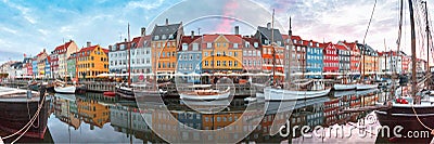 Nyhavn at sunrise in Copenhagen, Denmark. Stock Photo