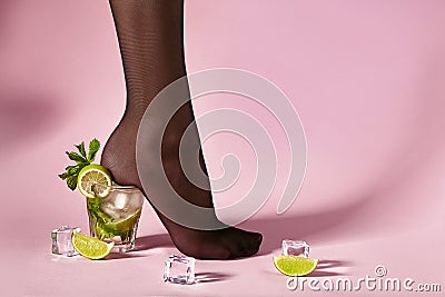 Nylons, stay-up, tights, hosiery, hose, pantyhose socks summer collection on pink background as a heel creative a glass of Stock Photo