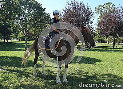 NYPD mounted unit police officer ready to protect public at Billie Jean King National Tennis Center during US Open 2016 Editorial Stock Photo