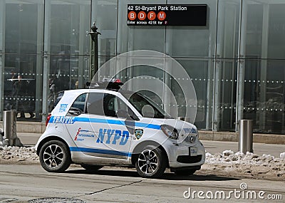 NYPD smallest car Smart ForTwo in Midtown Manhattan. Editorial Stock Photo