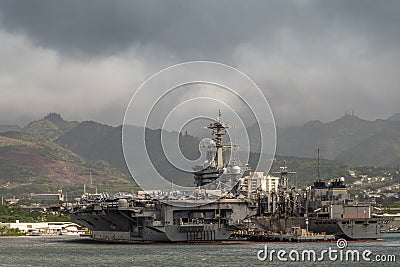 Abraham Lincoln aircraft carrier and USNS Arctic in Pearl Harbor, Oahu, Hawaii, USA Editorial Stock Photo