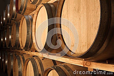 Oak barrels maturing red wine Stock Photo