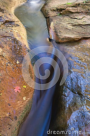Oak Creek channels through narrow slot in rocks, Sedona, Arizona Stock Photo