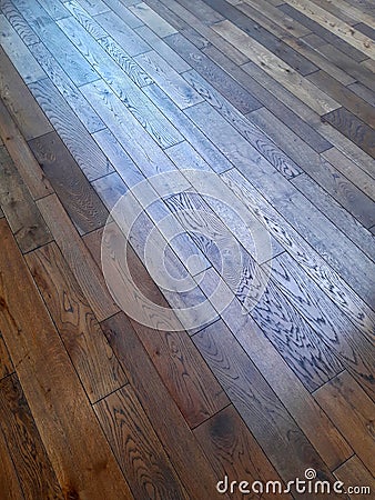 An oak floor with a distinctive pattern complemented by smaller Stock Photo