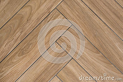 Oak wood texture of floor with tiles immitating hardwood flooring. Traditional herringbone pattern Stock Photo