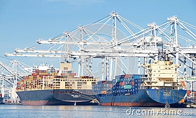 Cargo Ships loading at the Port of Oakland Editorial Stock Photo