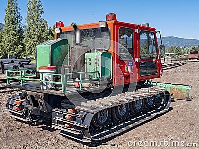 Oakridge, Oregon, USA - May 14, 2023: A Caterpillar BearTrac ATV snow groomer parked at the Union Pacific railyard Editorial Stock Photo