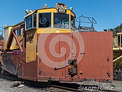 Oakridge, Oregon, USA - May 14, 2023: The front of the Union Pacific Jordan Spreader SPWM4033 parked in the rail yard Editorial Stock Photo