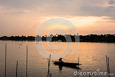 Oarsman sunset Editorial Stock Photo