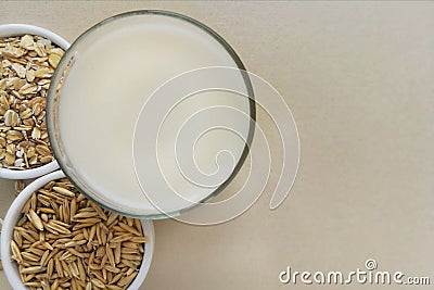 Oatmeal, oatmeal flakes and oats grains. Stock Photo