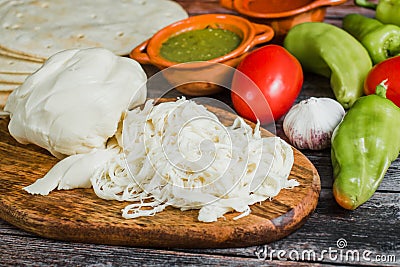 Oaxaca Chesse or queso oaxaca or quesillo is a Mexican fresh white Chesse from Mexico Stock Photo