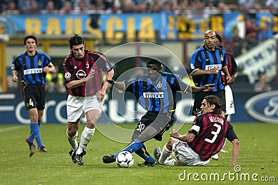 Obafemi Martins , Paolo Maldini and Kakhaber Kaladze in action during the match Editorial Stock Photo