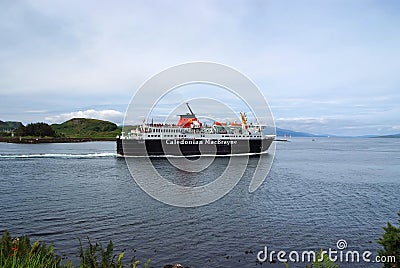 Oban, United Kingdom - February 20, 2010: Holiday ship navigate along sea coast. Cruise liner in sea. Cruise destination Editorial Stock Photo