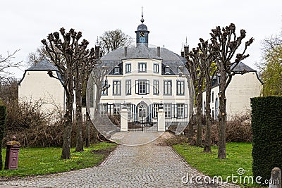 Obbicht, Limburg, The Netherlands - The white castle and lane of the region Editorial Stock Photo