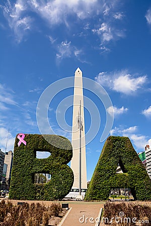 Obelisk and BA text with hedge in Buenos Aires Editorial Stock Photo
