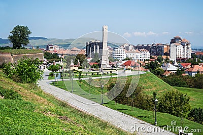 The obelisk of Horea, Closca and Crisan with the city in the background Editorial Stock Photo