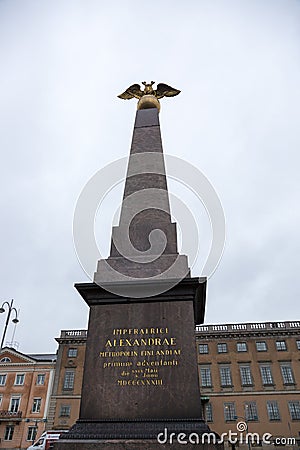 Obelisk in memory of the Russian Empress Alexandra Fedorovna on the Market Square of Editorial Stock Photo