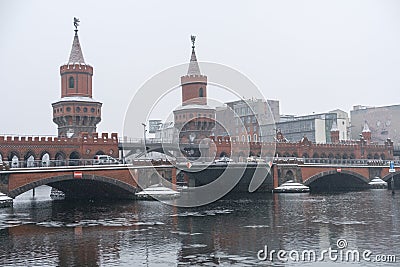 Oberbaum bridge OberbaumbrÃ¼cke in Berlin, winter Editorial Stock Photo