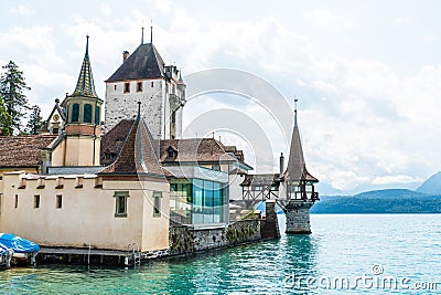 Oberhofen Castle with Thun Lake background in Switzerland Editorial Stock Photo