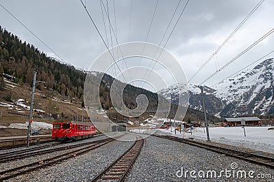 Swiss train goes to the mountain tunnel Editorial Stock Photo