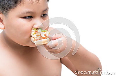 Obese fat boy eating seafood pizza Stock Photo