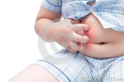 Obese fat boy scratch the itch with hand on belly Stock Photo