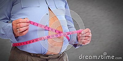 Obese man abdomen with measuring tape. Stock Photo