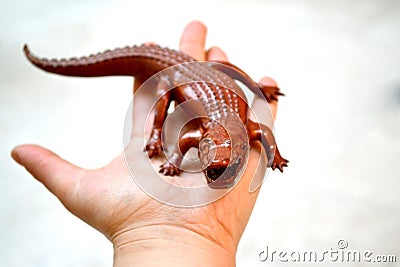 Object in the form of crocodile printed on a 3d printer and covered with enamel Stock Photo