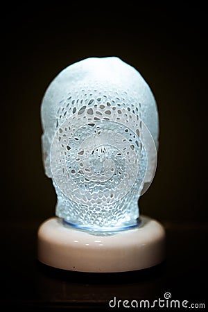 Objects in the form of a head with illumination photopolymer printed 3d printer. Stock Photo
