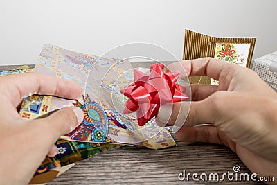Objects for wrapping a christmas gift full of colors Stock Photo
