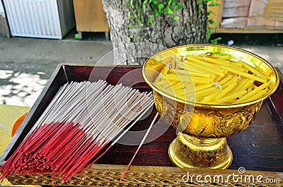 Oblation joss stick and candle at thailand temple Stock Photo