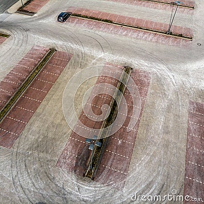 Oblique aerial photograph of an empty parking lot of a consumer market, abstract aerial view Stock Photo