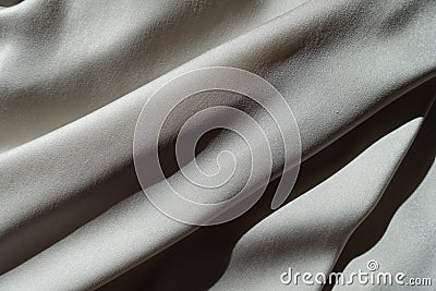 Oblique soft folds on grey chiffon fabric Stock Photo
