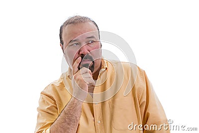 Observant speculative man standing thinking Stock Photo