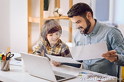 Observation of picture father and son. Stock Photo